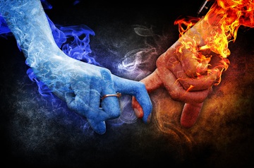 Two flaming hands come together: How strong is twin flame love?